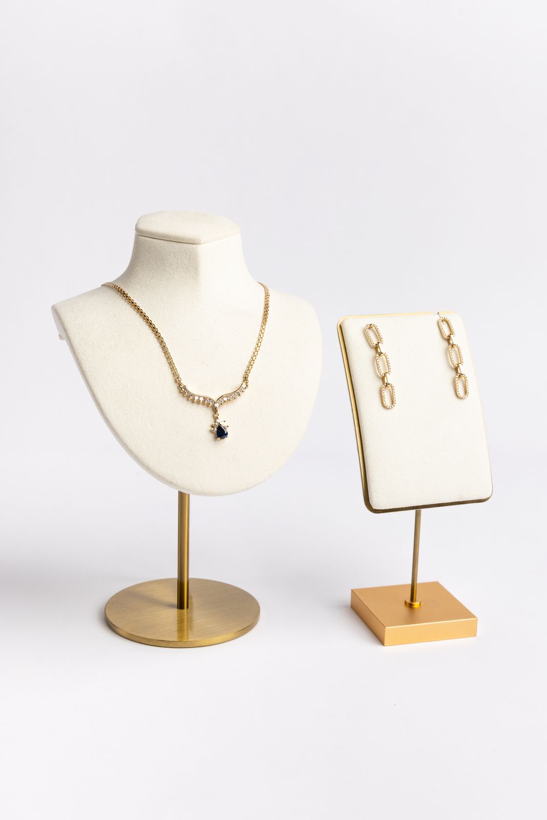 A fine jewelry suite presented on display busts